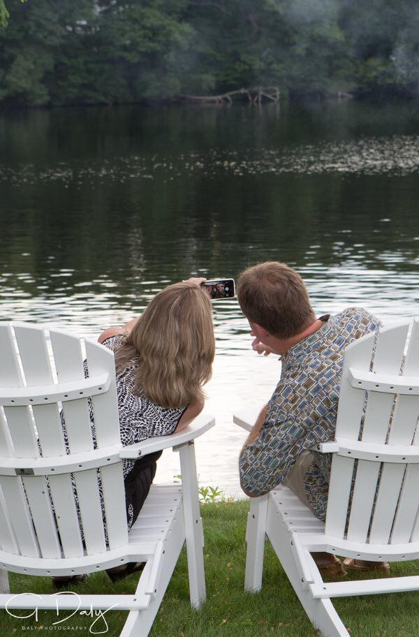 Couple-lakeside-selfie-white-chairs-summer-Vesper_Country_Club