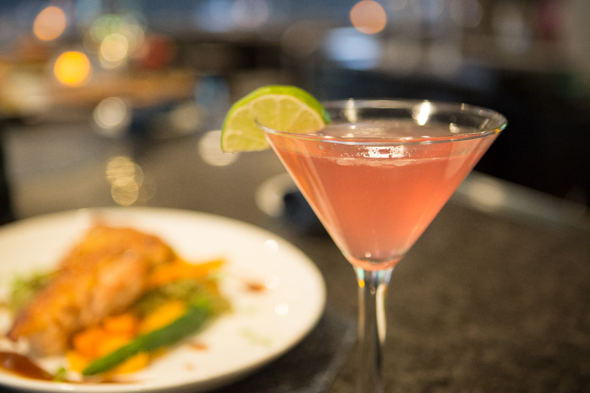 Cosmopolitan-cocktail-lime-garnish-bar-drink–Vesper-Country-Club